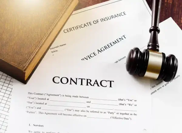 contract-agreement-and-gavel-on-wooden-table-2026-01-05-22-56-11-utc 1