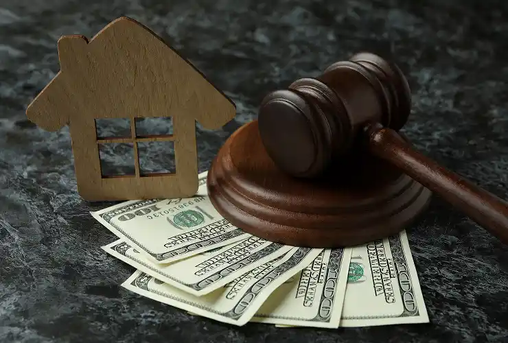 gavel-money-and-house-model-on-textured-backgroun-2026-03-24-22-42-06-utc 1