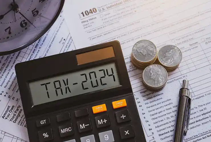 tax-preparation-with-calculator-clock-and-form-2026-01-07-01-27-06-utc 1 (1)
